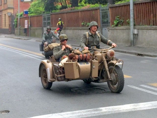 I dunno - look like Germans to me. There were a bunch of American motorcycles too.